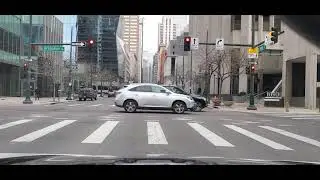 Driving through Downtown Denver from 6th and Lincoln to 6th and Broadway.