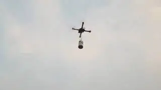 How it flies! Quadcopter (drone ) carrying load in Pakistan!