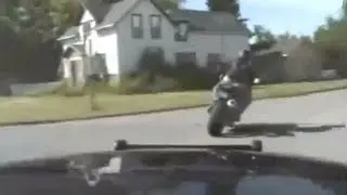 DashCam: See Ya!! Police chase fleeing motorcycle at high speeds, jump railroad tracks...