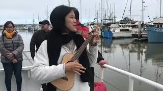 Khim performing Don’t Worry Be Happy on Hricane Ukulele