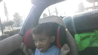 Zhi dancing in the car