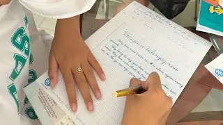 Graceful Strokes of a 10 - Year - Old Student in a Handwriting Competition