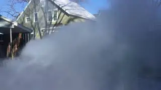 Woman Turns Boiling Water into Steam in Freezing Weather - 1021963