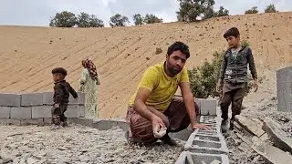 Construction of the house by father and his children