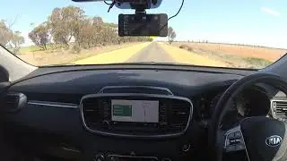 Openpilot on a narrow single lane road, with no lines.