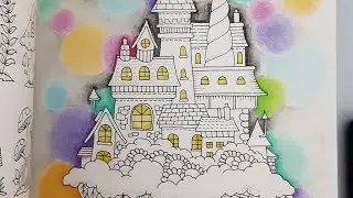Using colored pencils to create the bokeh effect on a coloring page background.