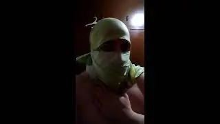 Out of green fabric, made a niqab mask