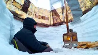 Camping in a Huge Snow Pit Covered by a Hot Tent
