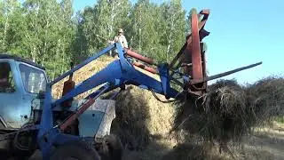 Последний  стог.  Александр скирдует самостоятельно сено. 5ч. сенокос 2020.