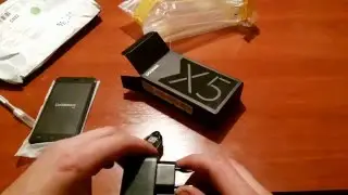 Doogee X5 распаковка обзор