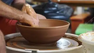 Throwing a serving bowl from stoneware clay