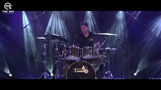 Tamburo drums on stage with Eric Kalver