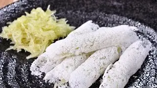 Thai Dessert - Roasted Pancake Wrapped with Candies Coconut (Kanom Gay Sorn Lum Jiak)
