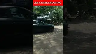 fillm car camer  shoting ll car   camera stands  and camera 