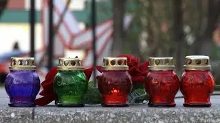 Охинцы вместе со всей страной зажгли свечи памяти