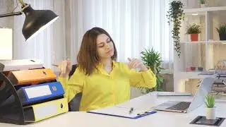 Cheerful young woman working at laptop in home office free stock videos