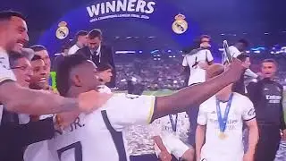 vinicius with 2024 champions league trophy