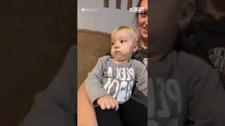 Baby not amused by mom's Lorax costume