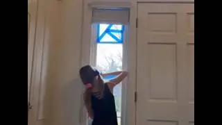 Coloring on my window with Sharpies! (So fun)