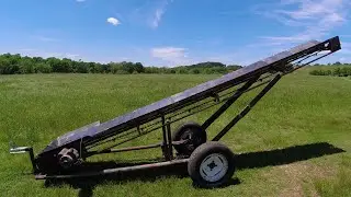 homemade firewood conveyor built from hay elevator