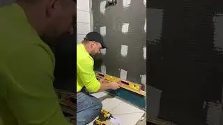 How to start tiling a shower wall. 