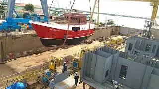 CRANING SHIP INTO THE DRY DOCK