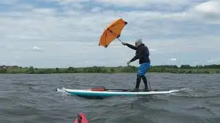 Umbrella SUP surfing