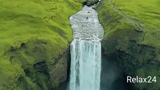 seljalandsfoss waterfall iceland  _ seljalandsfoss waterfall  drone view with relaxing music .