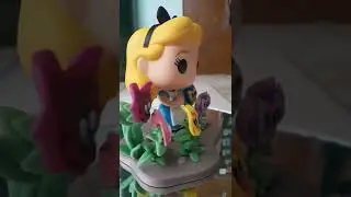 FUNKO POP ALICE IN WONDERLAND:ALICE WITH FLOWERS 
