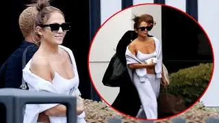 Jennifer Lopez looked stunning with her washboard abs as she touched down in Los Angeles