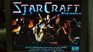 Windows 2000 running on a 486SX-25 and playing Starcraft