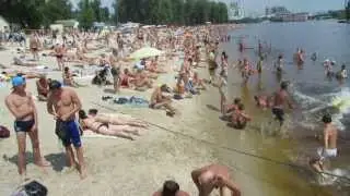 Swimming in a beach on the Dnipro River (Dnieper) in Kylv (Kiev) near hydro Park