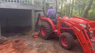 Kubota L2501 Backhoe Dangerously Close