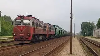 Diesel locomotive 2M62M-1198 with a freight train
