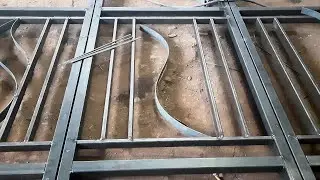 making a folding metal door design , folding gate design for home