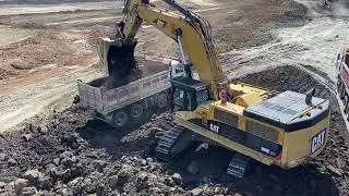 Caterpillar 385C Excavator Loading Mercedes & MAN Trucks - Interkat SA