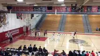 5'11 PG Joseph Riley #23 white jersey
