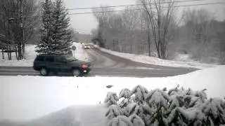 Last of the cars coming down the hill haha snowy hill