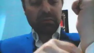 Como se coloca botões de punho
