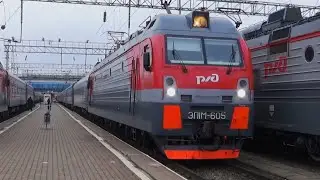 ЭП1М-605 отправляется со станции Ростов Главный с пассажирским поездом.