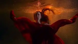 Underwater video shooting. beautiful mermaid