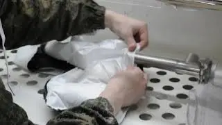 Процесс набивки пуховых пакетов. ЗАО Одежда и Мода Иваново