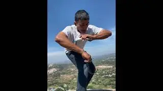Friend dancing on the top of Poligundu rock mountain Andhra near Chennai