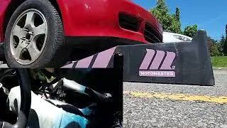 (100) How to use car ramps with a stick shift (clutch before gas)
