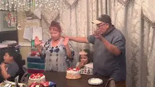 Cutting a cake for Zuri and her Aunt
