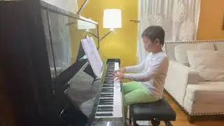 A little slavonic rhapsody from John Thompson modern course for the piano the second grade book
