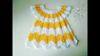 Crochet dress with a round yoke. 
