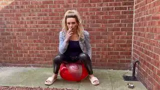 Beach ball smoking cigarette popping