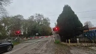 801221 91130/82205 Passing Carlton Level crossing