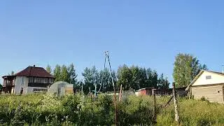 2023-06-12 Поливная установка, горох и арбузы на склоне у озера